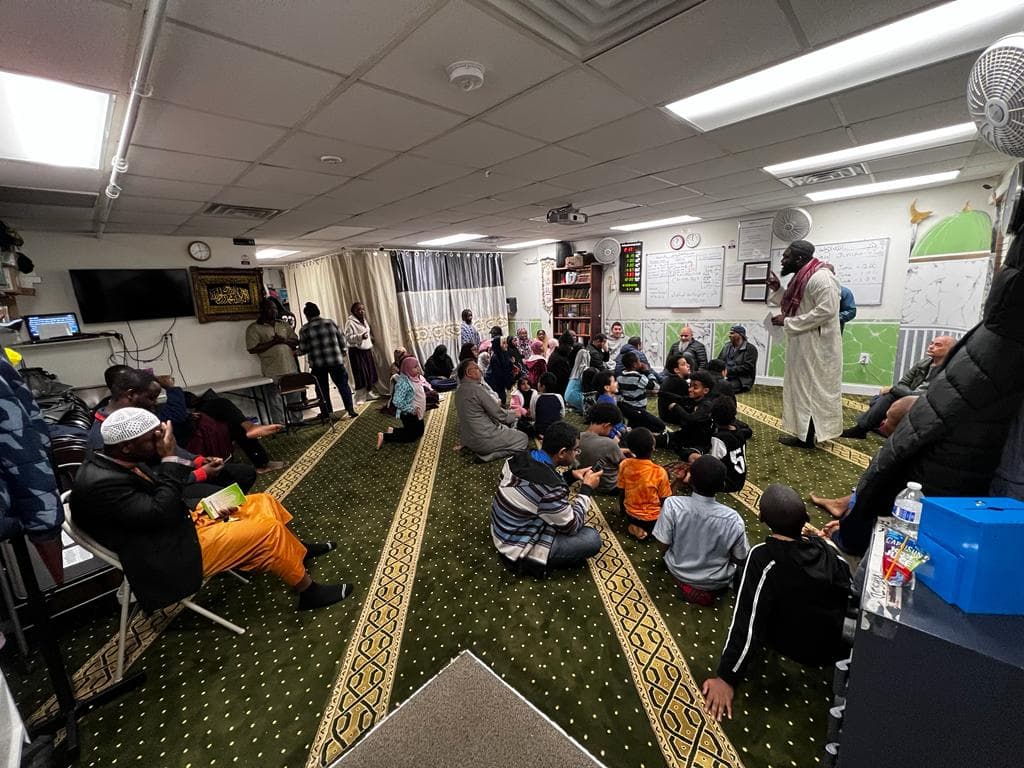 Children and families participating in a Haskay activity