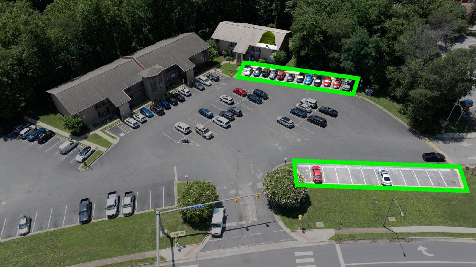 Close aerial view of Haskay Masjid parking rows marked in green