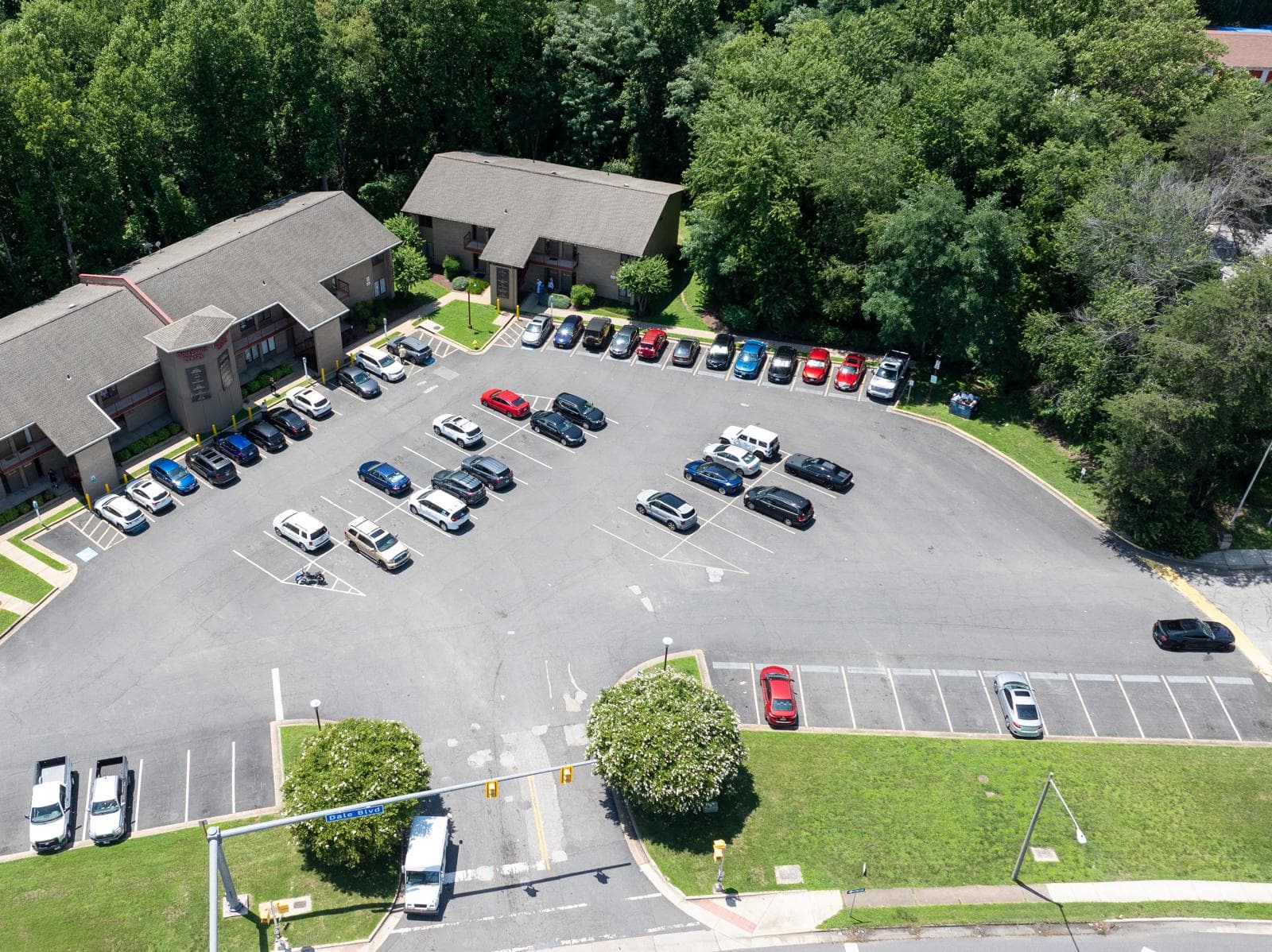 Aerial view of the parking lot entrance off Dale Blvd near Haskay Masjid